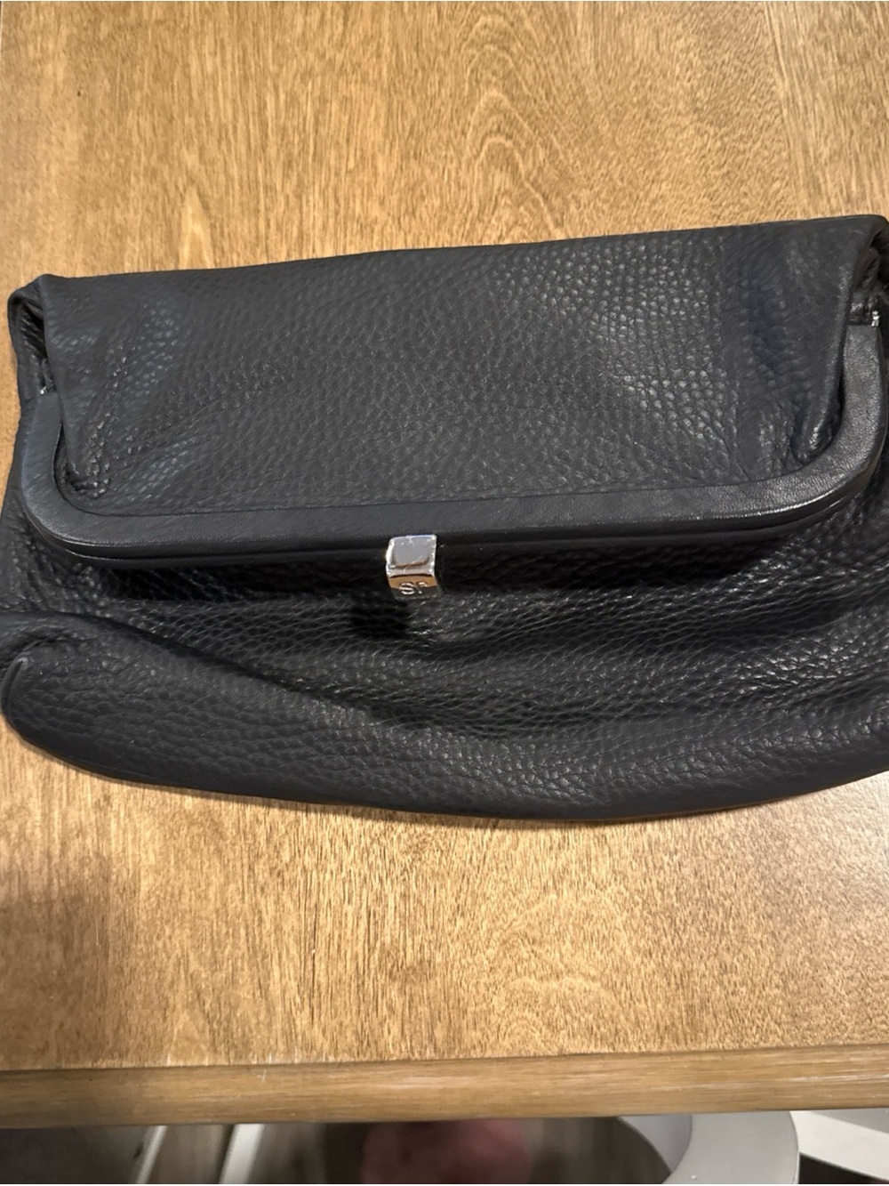 Jill Stuart Black Pebbled Leather Clutch with Silver-Tone Accent